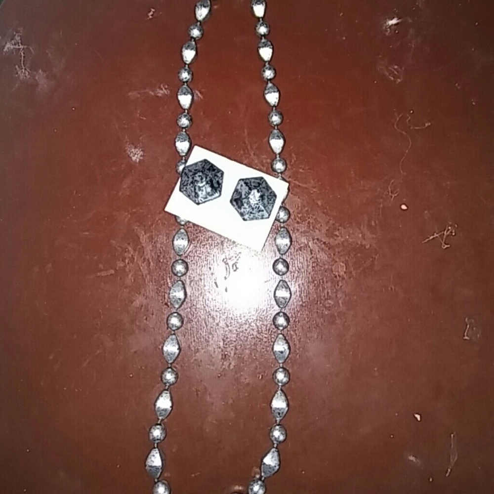 Silver necklace and earrings